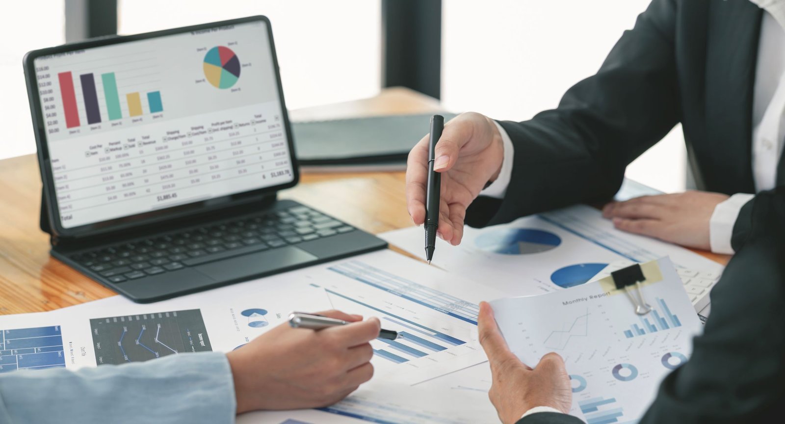 Business setup consultants discussing company formation in Dubai office