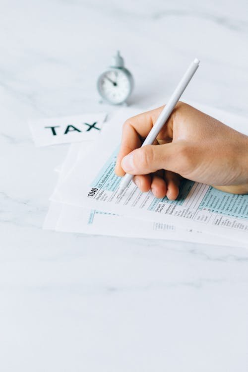Person filing UAE corporate tax documents before September 30 deadline 2026