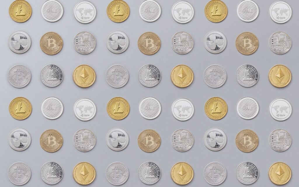Business professional reviewing cryptocurrency and blockchain data on a laptop, representing VARA virtual asset licensing in Dubai