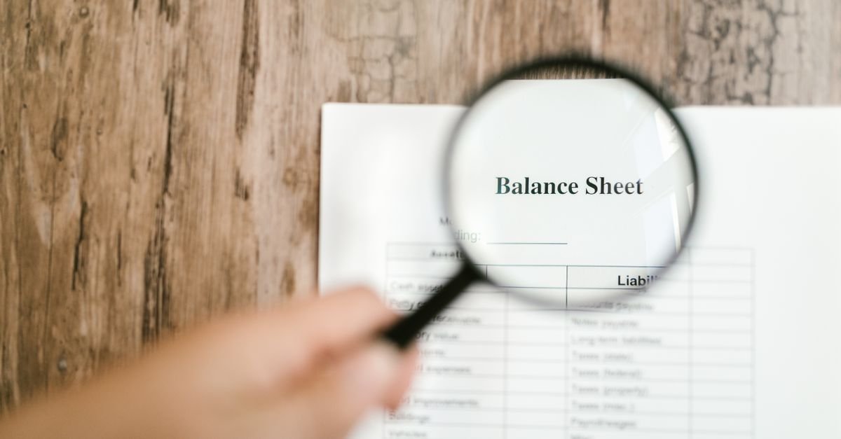 Accountant reviewing financial statements and reports for IFRS 18 compliance