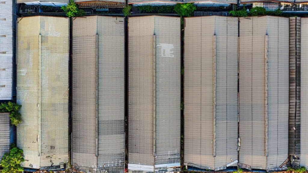 Modern industrial warehouse building exterior representing a large capital asset under the UAE VAT Capital Assets Scheme