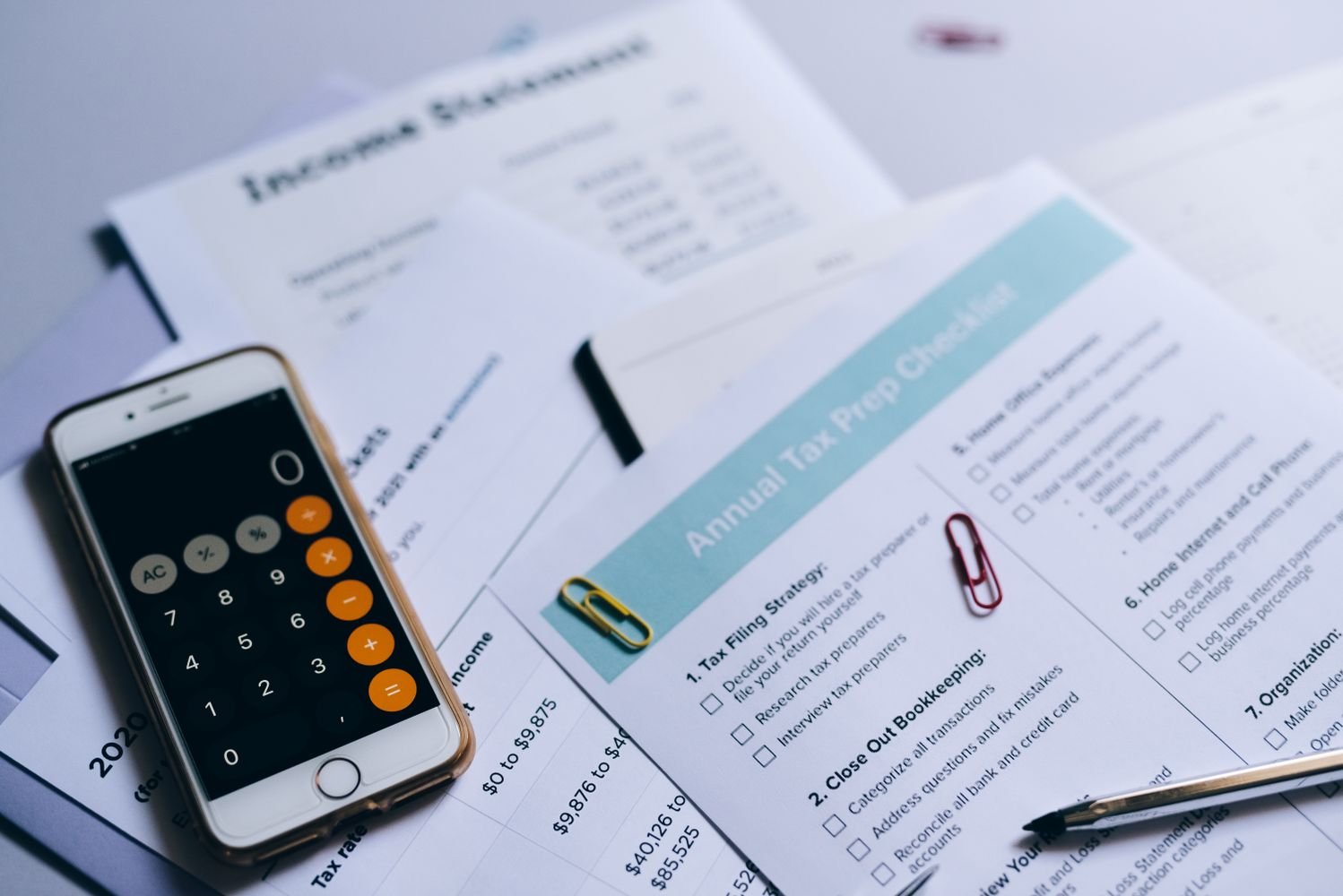 Business documents and tax invoices being reviewed for VAT compliance in the UAE