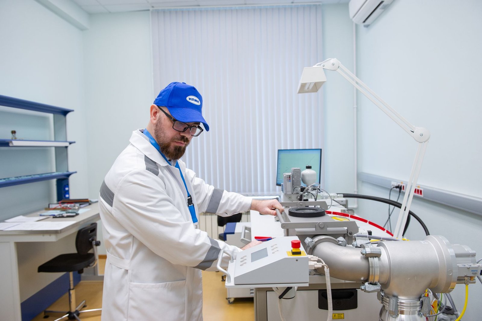 Lab technician operating scientific research equipment, representing UAE Corporate Tax R&D incentive eligible research activity