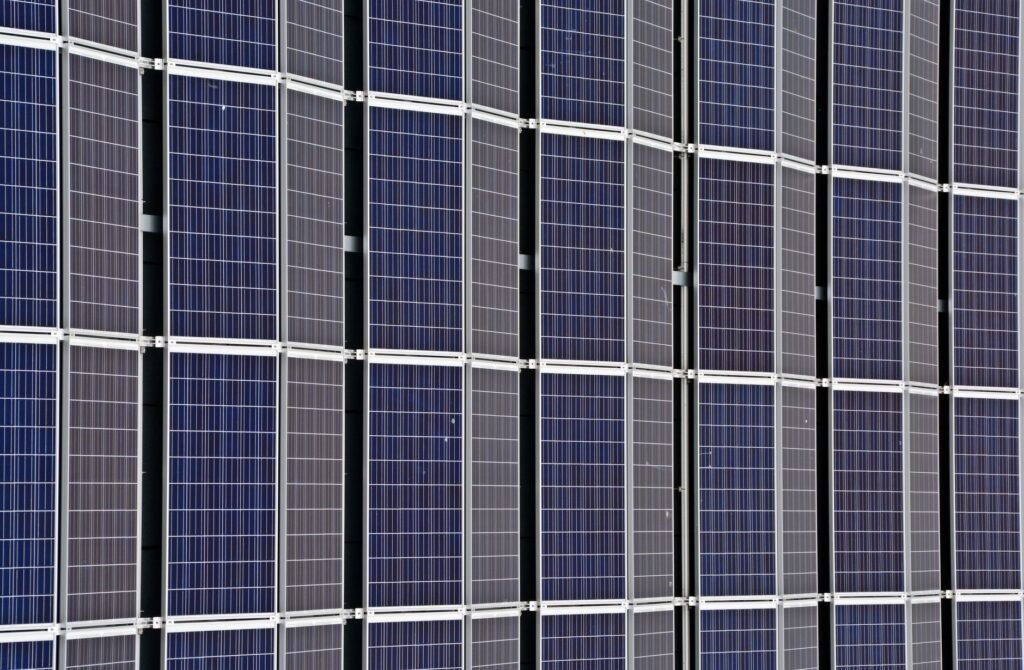 Close-up of solar panels representing clean energy and Masdar City Free Zone in Abu Dhabi